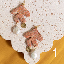 Load image into Gallery viewer, Textured Coral Earrings with Freshwater Pearl and Round Brass Charm