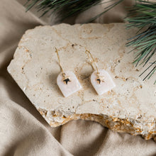 Load image into Gallery viewer, Cute festive hoop earrings with star charms.