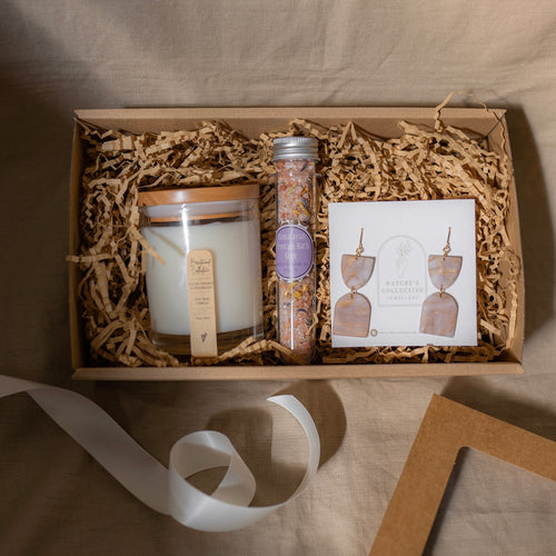 Thoughtful gift hamper boxes with lightweight earrings, soy candle and organic bath salt
