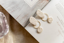 Load image into Gallery viewer, Textured Neutral Organic Shape Dangle Earrings with Brass Circle / Unique Minimal Dainty Dangle Beige Earringsarrings
